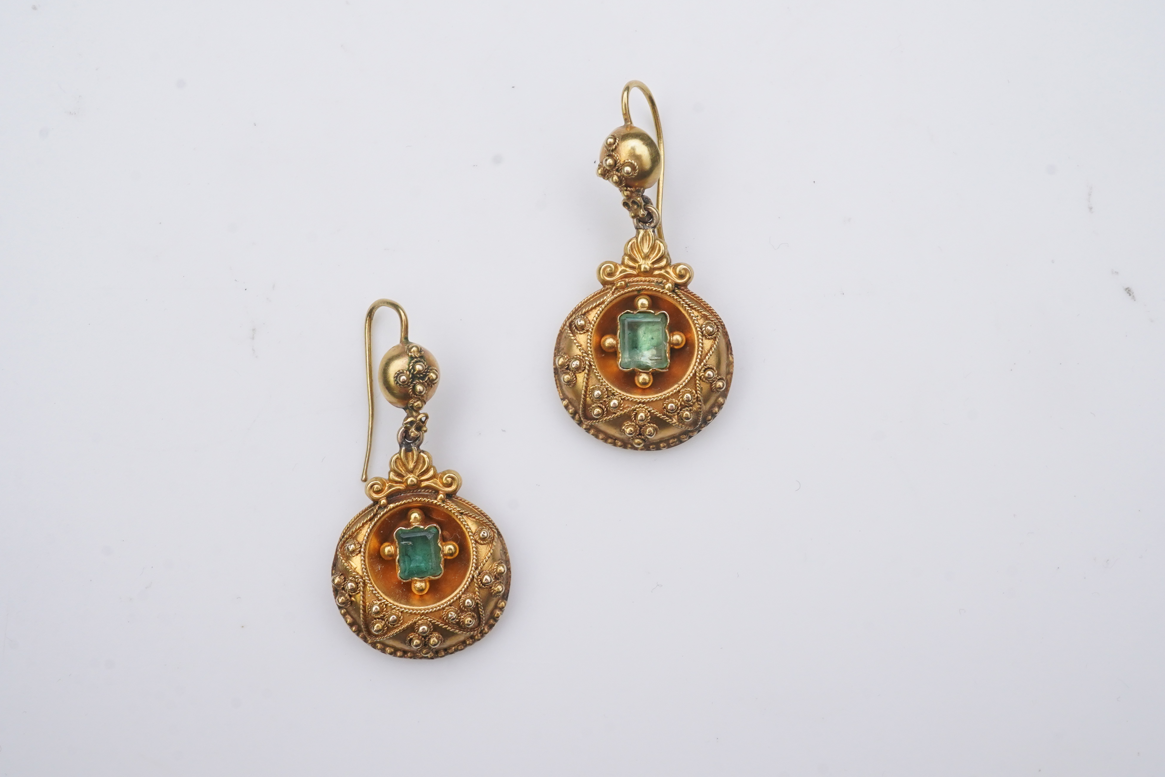 A pair of Victorian emerald and gold earrings, third quarter 19th century